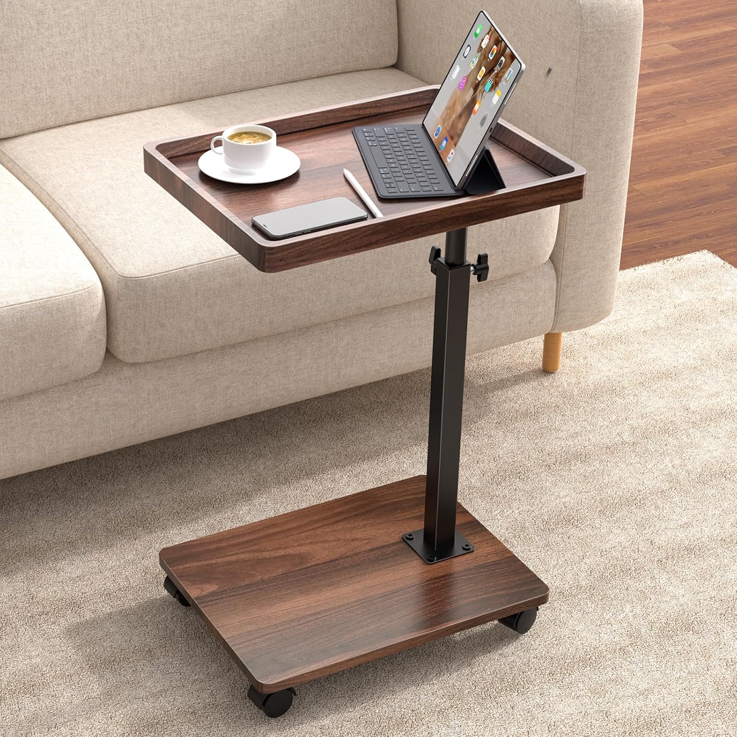 Swiveling, height-adjustable C-shaped side table for compact living spaces